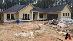 Construction: Shingles on, siding going up