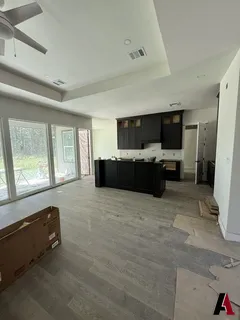 Construction: Kitchen cabinets and floors in