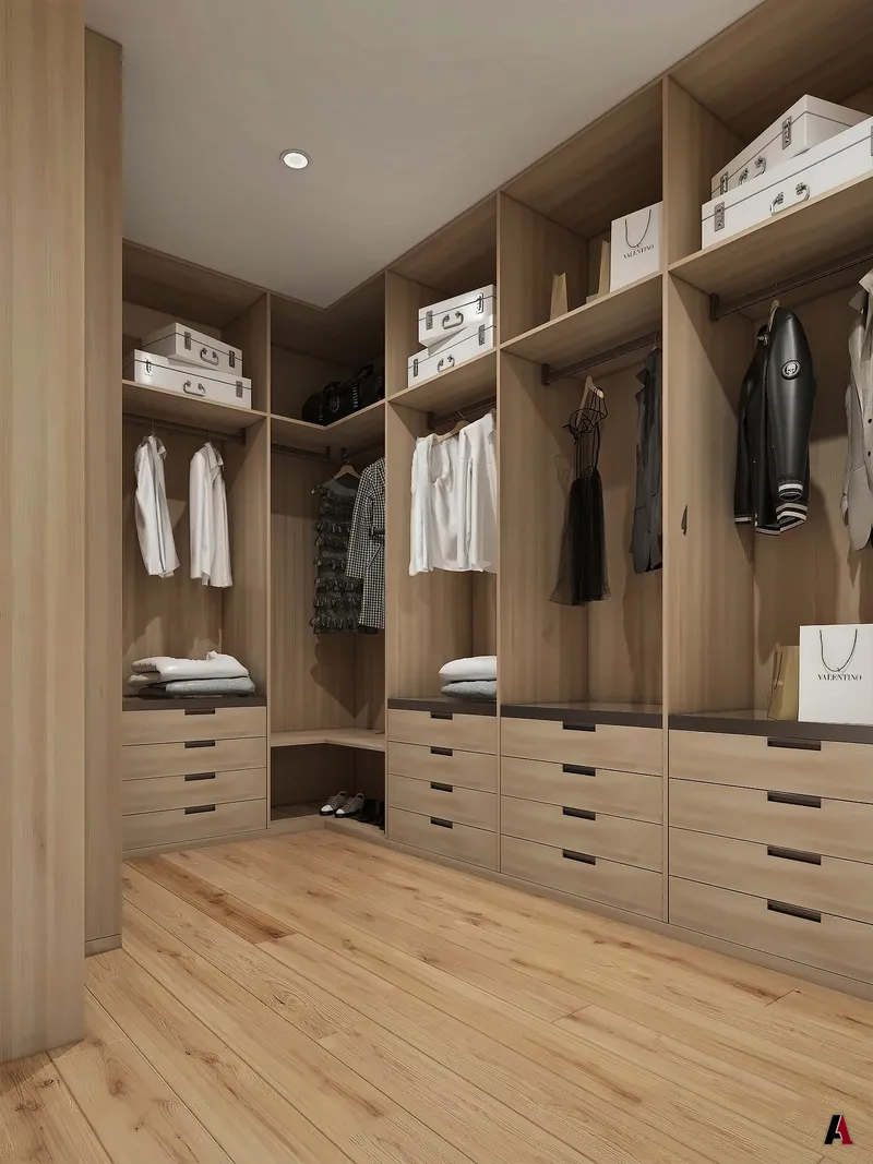 Rendering of a walk-in primary closet with light wood shelving, hanging rods and drawers, designed by A1 Design and Construction