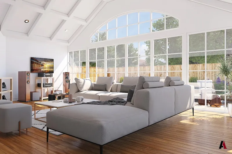 Great room interior with vaulted ceiling, arched windows and sectional sofa, designed by A1 Design and Construction