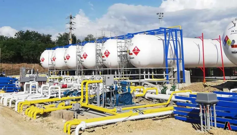 LPG storage tanks with yellow and white process piping, pumps and blue structural steel, designed by A1 Design and Construction