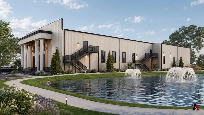 Metal-building school and event campus with a columned entrance and fountain pond, designed by A1 Design and Construction